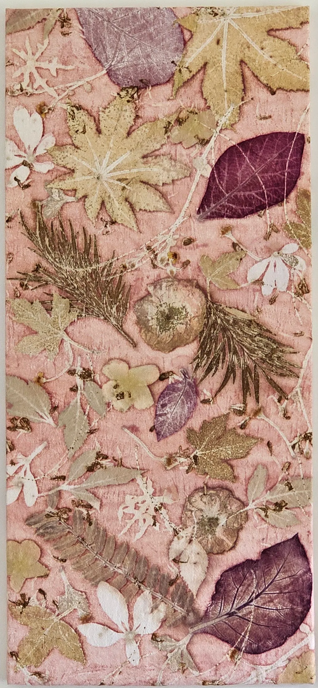 Blush-pink panel layered with burgundy leaves, pale palmate leaves, fern fronds and small flower prints.